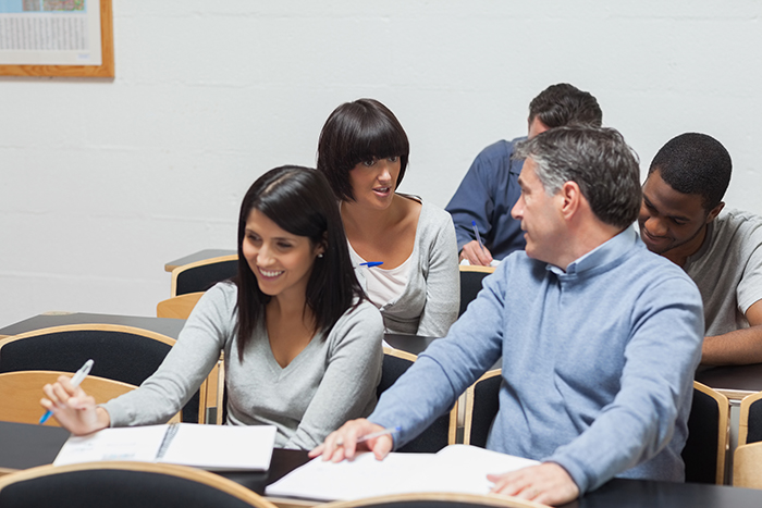 Students talking in lecture hall